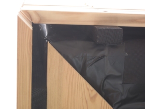 Fassadenfließ unter der Holzfassade
